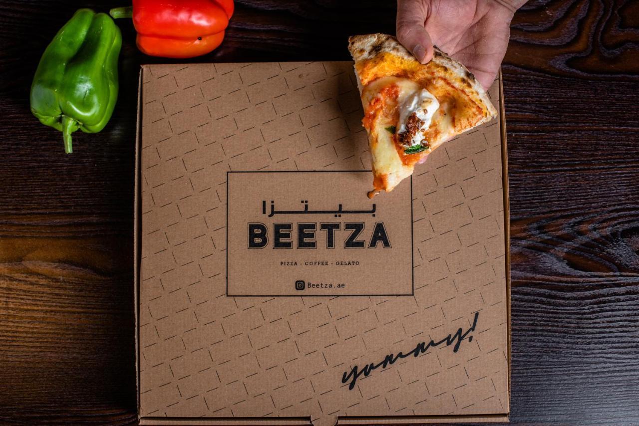 Officers Club & Hotel Abu Dhabi Ngoại thất bức ảnh Beetza pizza