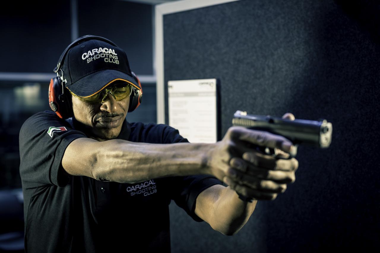 Officers Club & Hotel Abu Dhabi Ngoại thất bức ảnh A shooter in the 2012 ISSF World Cup